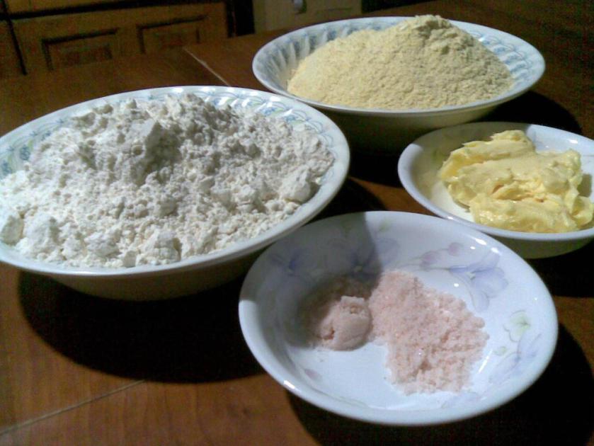 Clockwise from the top: Cornmeal, Butter, Salt, Wheat Flour.